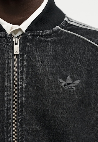 ADIDAS ORIGINALSPrijelazna jakna 'SST TT' - crna boja