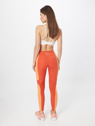 NIKE Skinny Sporthose in Orange