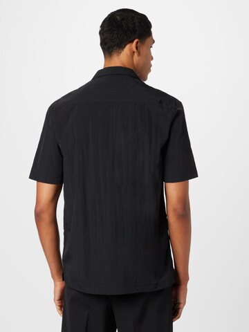 Han Kjøbenhavn Regular fit Button Up Shirt in Black