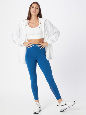 Skinny Pantaloni sportivi di NIKE in blu