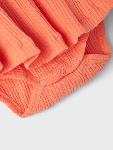 NAME IT - Pijama entero/body en naranja