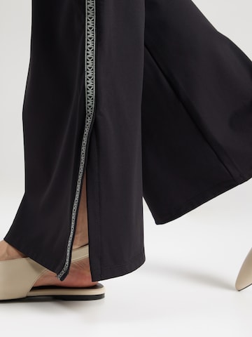 MICHAEL Michael Kors Rozkloszowany krój Spodnie w kolorze czarny