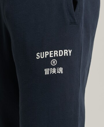 Superdry - Tapered Calças em azul