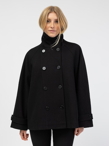 BROKE + SCHÖN Winter Coat in Black: front