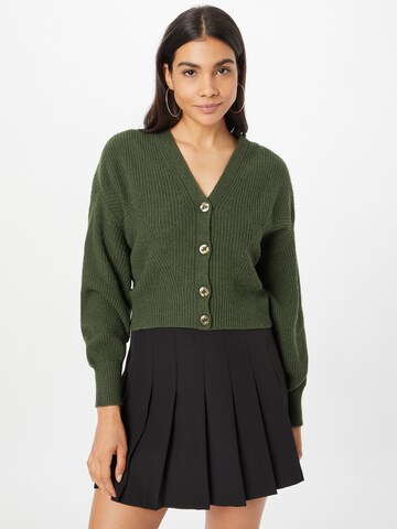 Geacă tricotată de la Sisley pe verde: față