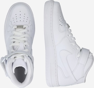 Nike Sportswear Korkeavartiset tennarit 'AIR FORCE 1 07 MID' värissä valkoinen