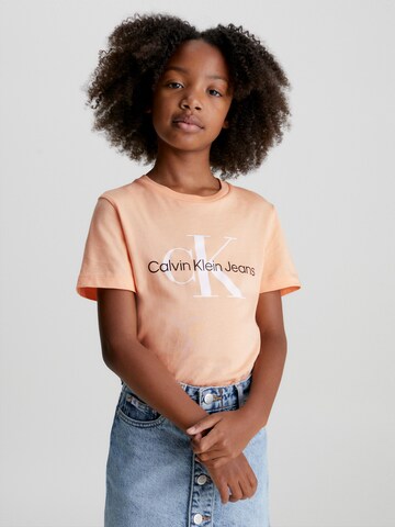 Calvin Klein Jeans - Camisola em laranja: frente