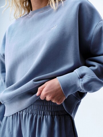 self. Sweatshirt in Blue