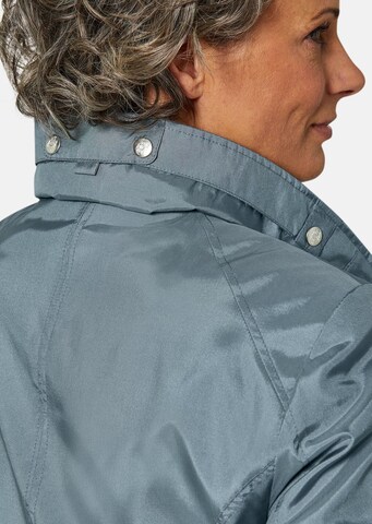 Goldner Jacke in Blau