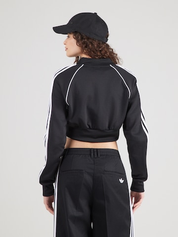 ADIDAS ORIGINALS Collegetakki 'SST' värissä musta