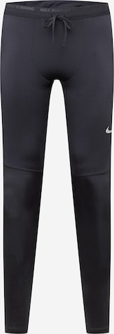Skinny Pantalon de sport 'Phenom' NIKE en noir : devant
