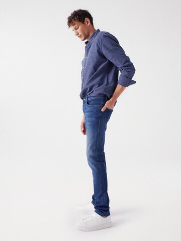 Coupe slim Jean Salsa Jeans en bleu