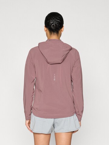 NIKESportska jakna 'SWIFT' - smeđa boja