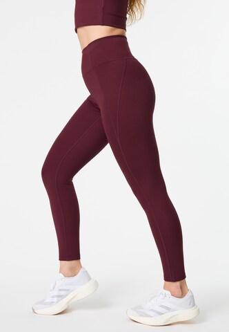 Skinny Pantalon de sport Girlfriend Collective en rouge