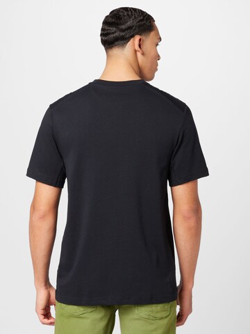 T-Shirt fonctionnel 'Primary' NIKE en noir