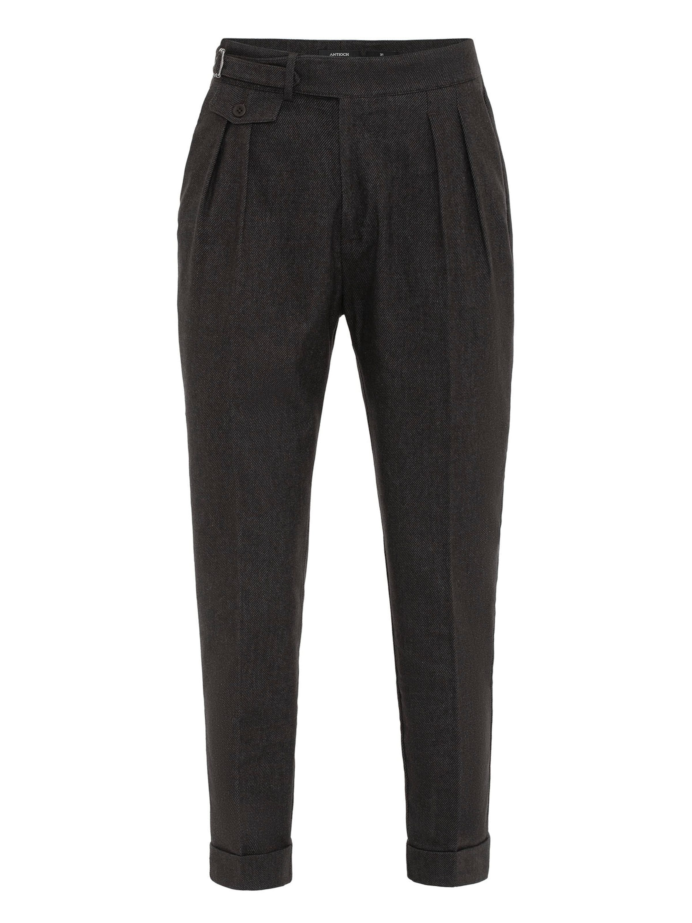 Antioch Pleat-front trousers in Brown: front