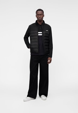 ELLESSE Between-Season Jacket 'Solzago' in Black