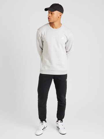 ADIDAS SPORTSWEAR Αθλητική μπλούζα φούτερ σε γκρι
