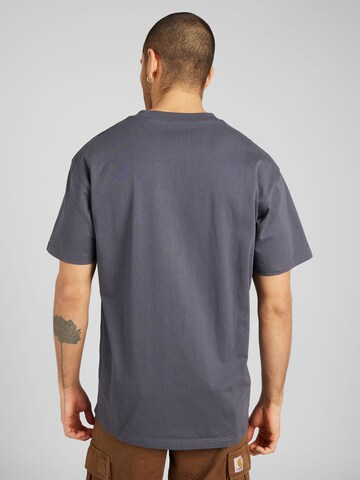 Carhartt WIP Bluser & t-shirts 'American Script' i grå