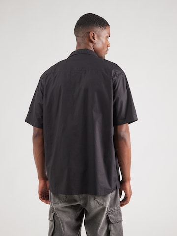 Han Kjøbenhavn Regular fit Button Up Shirt in Black