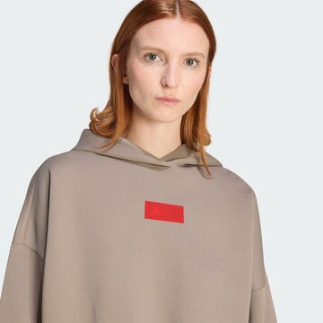 ADIDAS PERFORMANCE Sportief sweatshirt 'AUDI REVOLUT F1 TEAM ELEVATED' in Bruin