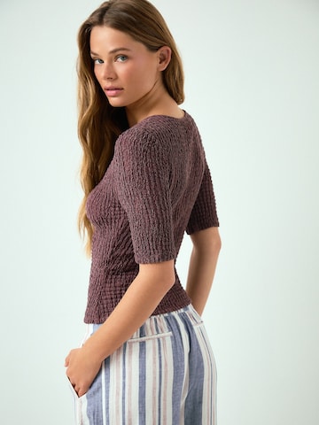 Cardigan Next en rose