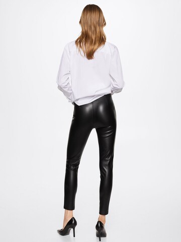 MANGO Skinny Leggingsit värissä musta