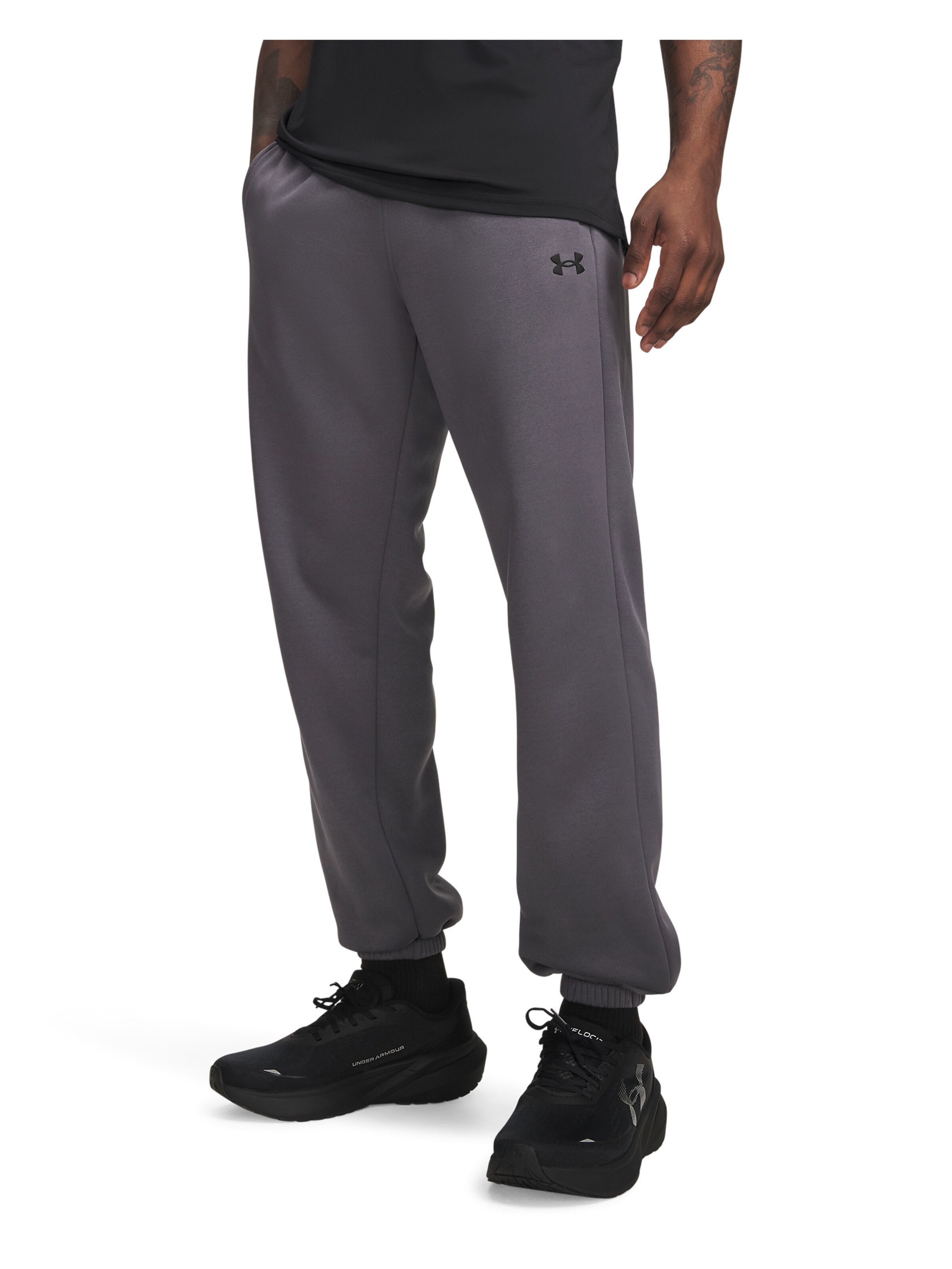 UNDER ARMOUR Tapered Sports trousers in Grey: front