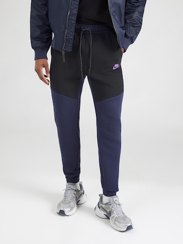 Nike Sportswear Конический (Tapered) Штаны 'TCH FLC' в Черный: спереди