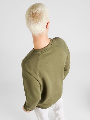 UNDER ARMOUR Sports sweatshirt 'Rival' in Green