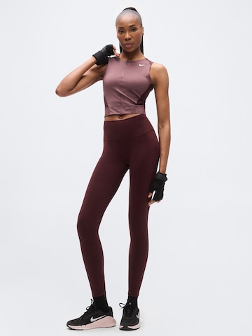 Sport top de la NIKE pe roșu