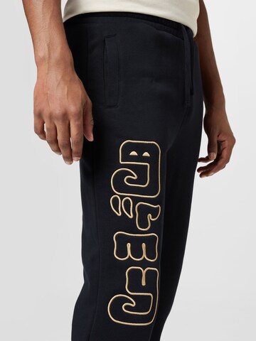 Grimey - Loosefit Pantalón 'LUST MANTRA' en negro