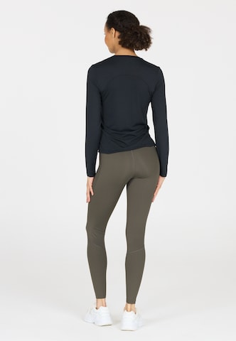 Athlecia Skinny Sportbroek 'Aliya' in Bruin