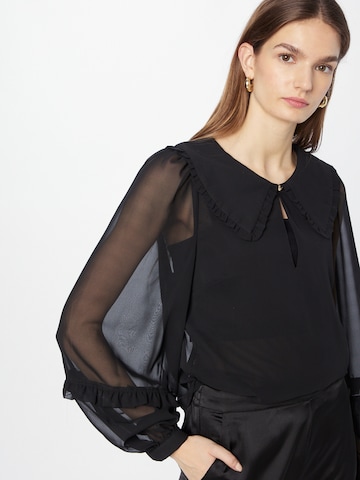 Louche Bluse 'TUPPENCE' in Schwarz