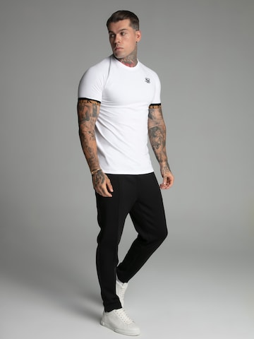 Coupe slim Pantalon SikSilk en noir