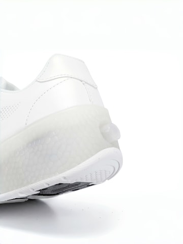 HUSKSWARE Inline and Roller Skates in White