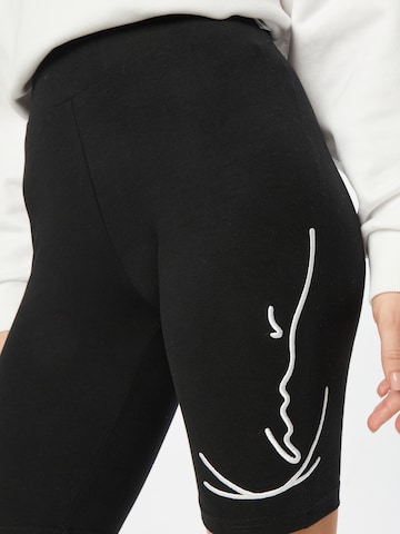 Skinny Leggings di Karl Kani in nero