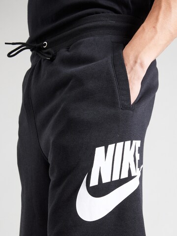 Loosefit Pantaloni 'CLUB ALUMNI' di Nike Sportswear in nero