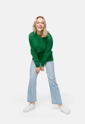 smiler. Sweatshirt dude. in Grün: Vorderseite