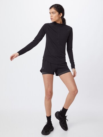 UNDER ARMOUR Functioneel shirt 'Streaker' in Zwart