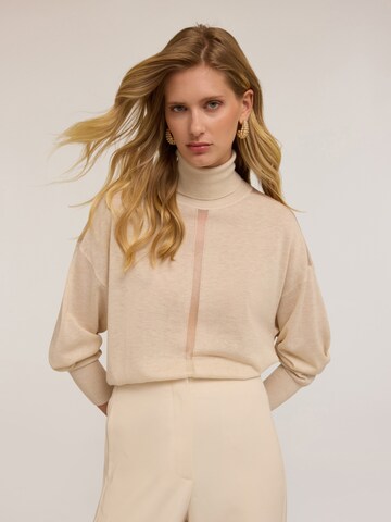 Pull-over MOTIVI en beige : devant