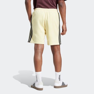 ADIDAS SPORTSWEAR Regular Sports trousers 'Essential' in Yellow