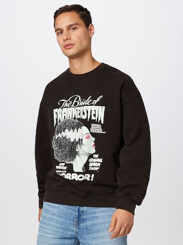 LEVI'S ® Bluzka sportowa 'Xmonsters Crew Sweatshirt' w kolorze czarny: przód