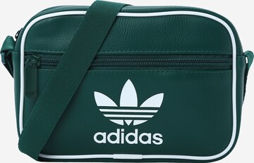 ADIDAS ORIGINALS Чанта за през рамо тип преметка в зелено: отпред