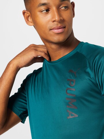 PUMA Sportshirt in Grün