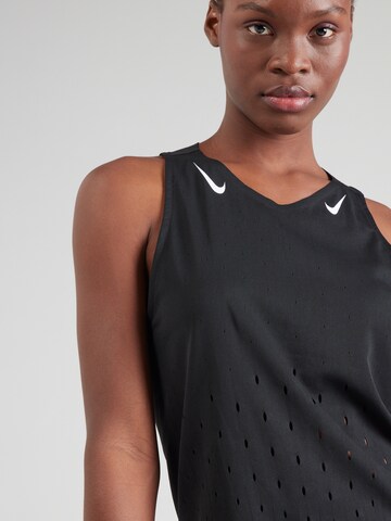 Top sportivo 'AeroSwift' di NIKE in nero