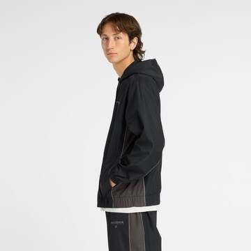 Veste mi-saison 'Trackside' new balance en noir