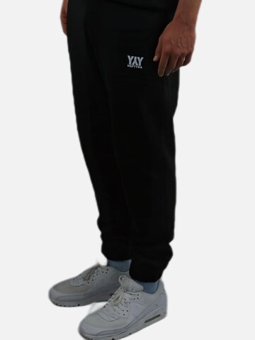 HEFTYKA Regular Sporthose‌ in Schwarz