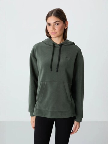 Sweat-shirt Tommy Life en vert
