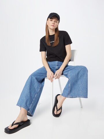 Calvin Klein Jeans Tričko 'Institutional' – černá